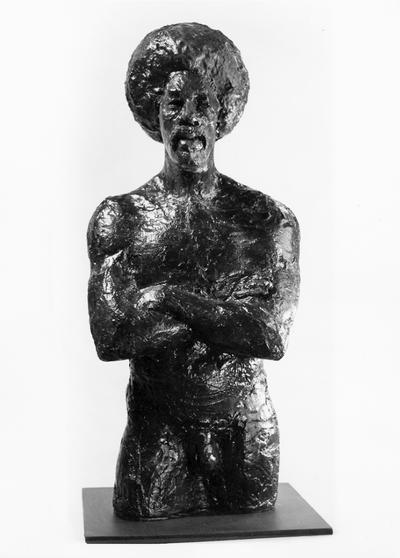 A fiberglass sculpture of a male nude, head and torso, by John Tuska