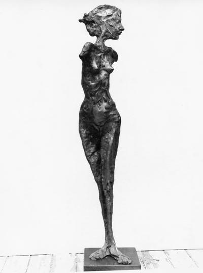 A fiberglass sculpture of a female nude without arms by John Tuska