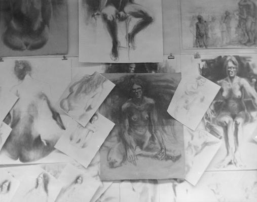 Pencil and ink drawings of human figures hanging on a wall by John Tuska. The model for many of the drawings was a woman named Sarah