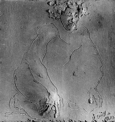 A ceramic tile relief of a male nude by John Tuska