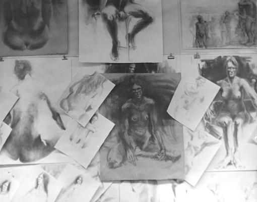 Pencil and ink drawings of human figures hanging on a wall by John Tuska. The model for many of the drawings was a woman named Sarah
