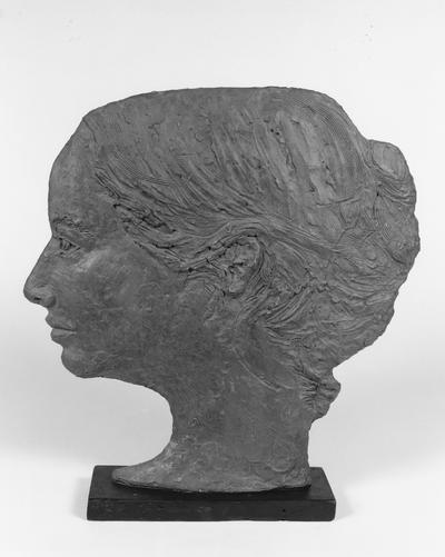 A ceramic female head sculpture entitled 
