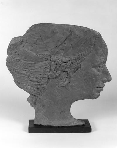 A ceramic female head sculpture entitled 
