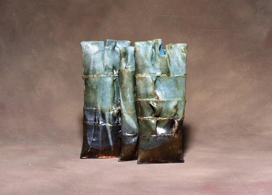 Three ceramic pouch vessels by John Tuska