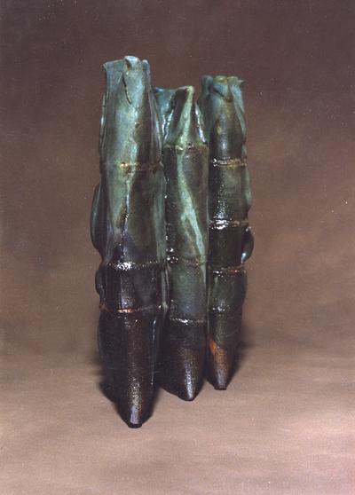 Three ceramic pouch vessels by John Tuska