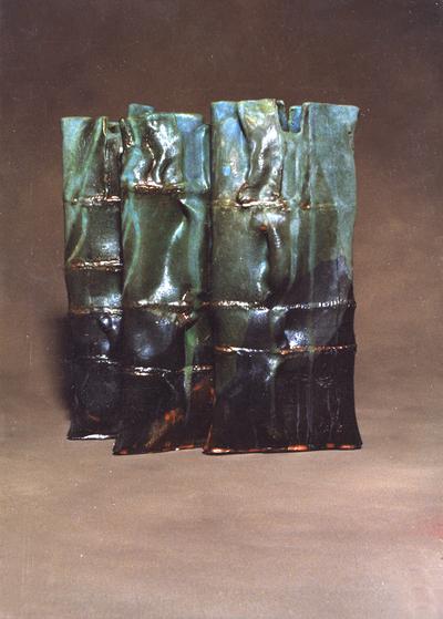 Three ceramic pouch vessels by John Tuska
