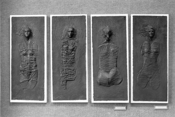 Four cast paper and graphite sculptures of female figures entitled 