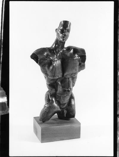 The front of a bronze sculpture entitled 