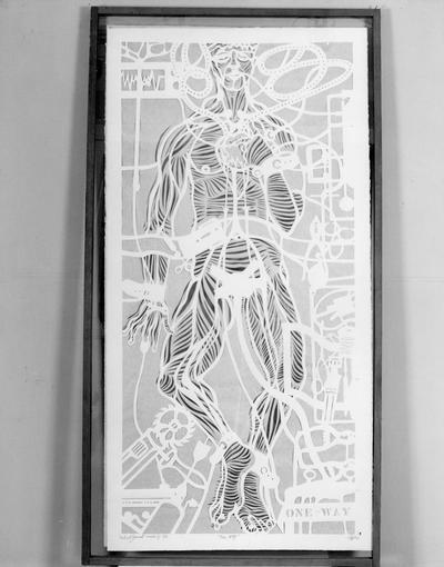 A paper cut of a human figure entitled 