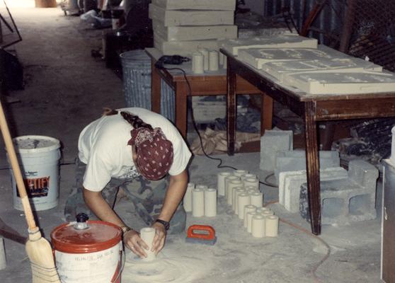 Scott Oberlink making sand molds in the University of Kentucky foundry for the casting 