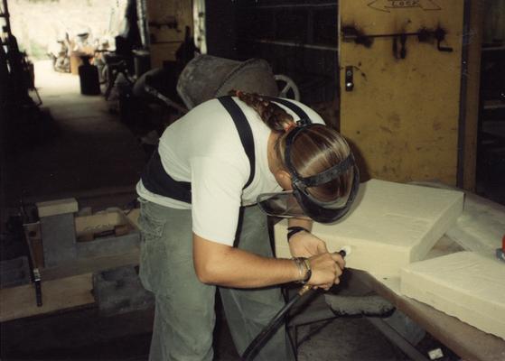 Scott Oberlink making sand molds in the University of Kentucky foundry for the casting 