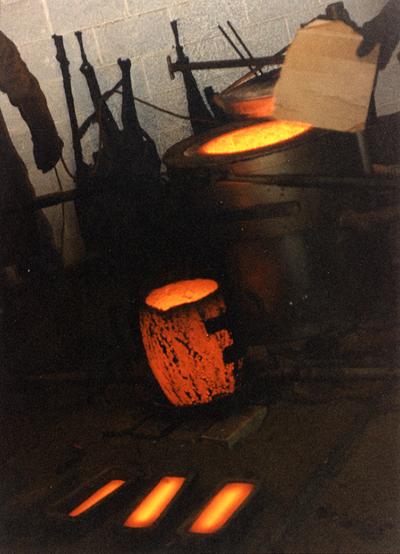 The furnace and crucible after a pouring at the University of Kentucky foundry during the casting of 