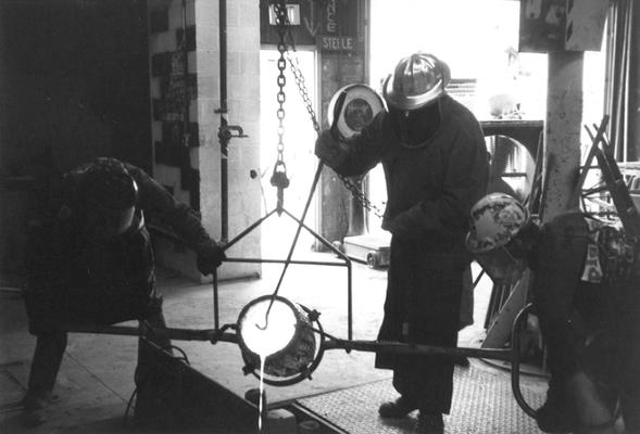 Scott Oberlink, Jack Gron and Andrew Marsh pouring bronze for the last cast at the University of Kentucky foundry of 