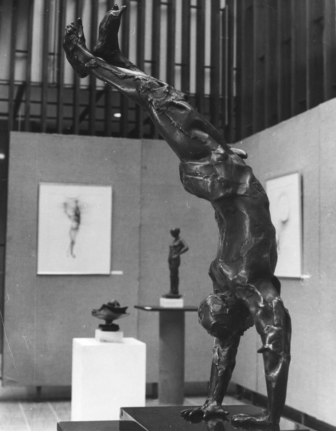 Three bronze figure sculptures, one entitled 