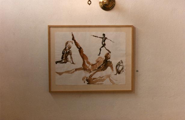 An ink drawing of human figures in an exhibit entitled 