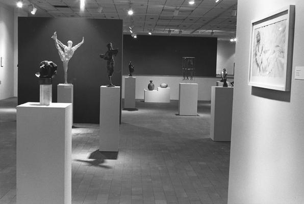 An image of sculptures, pots and drawings, including a aluminum and plexiglass sculpture entitled 