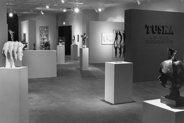 An image of drawings and sculptures, including the bronze sculpture entitled 