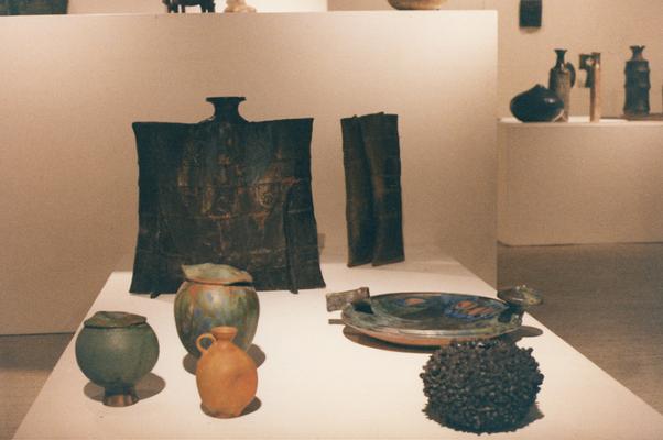 An image of numerous ceramic vessels, including a large pouch vessel, in the 