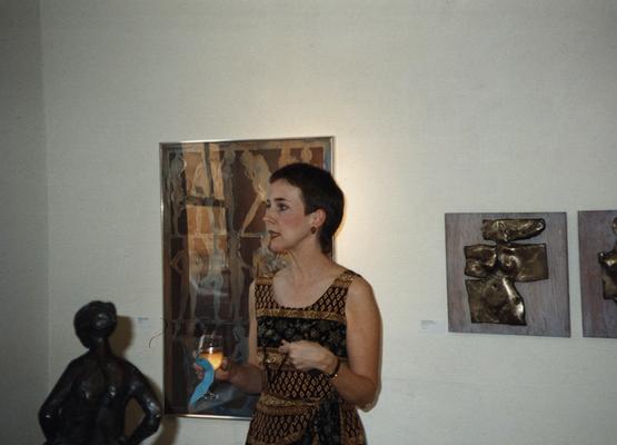An unidentified woman at the Heike Pickett Gallery for an 
