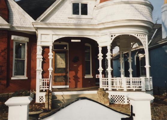 The front entrance of the Tuska Gallery house, which was the home of John Tuska. The house is a one and a half story Queen Ann, with a circular porch