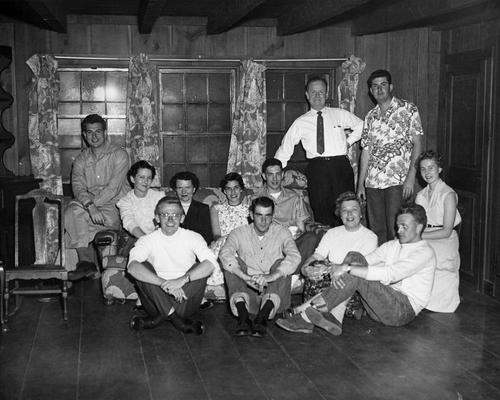 An image of John Tuska and a group of unidentified persons at Alfred University in Alfred, New York