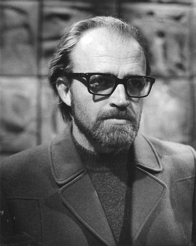 An image of John Tuska with a beard and glasses