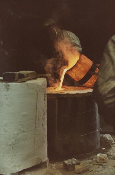 John Tuska pouring for a cast at the University of Kentucky foundry. The photograph was taken by Ted Bronda