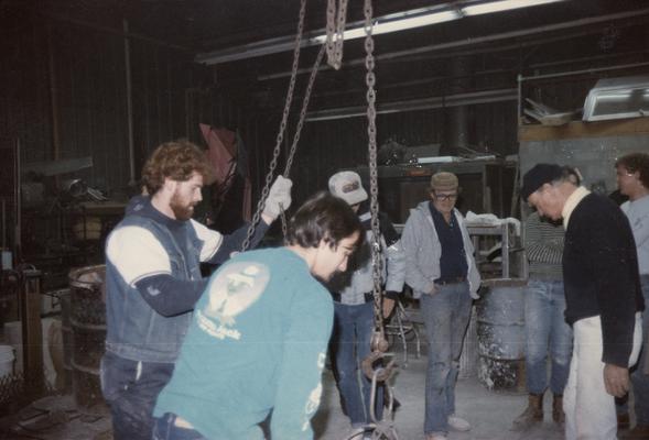 John Tuska and students working in the University of Kentucky foundry. The photograph was taken by Zig Gierlach