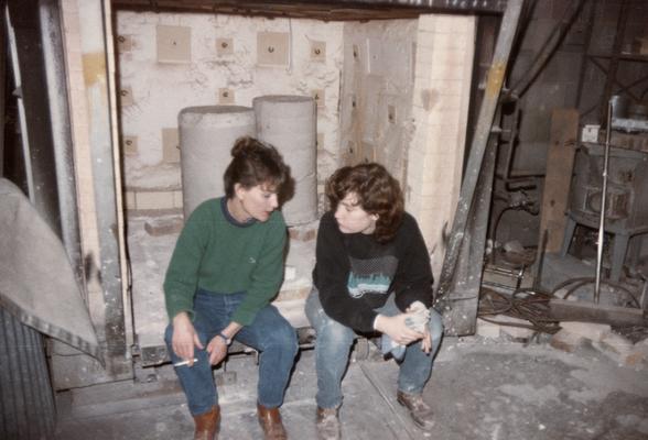 Two students in the University of Kentucky foundry. The photograph was taken by Zig Gierlach