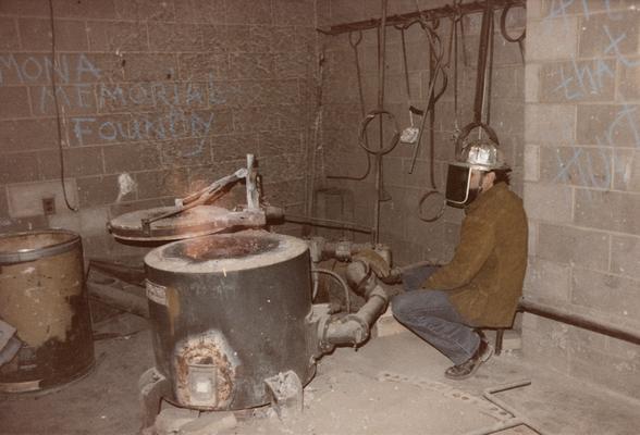 Jack Gron near the furnace in the University of Kentucky foundry. The photograph was taken by Zig Gierlach