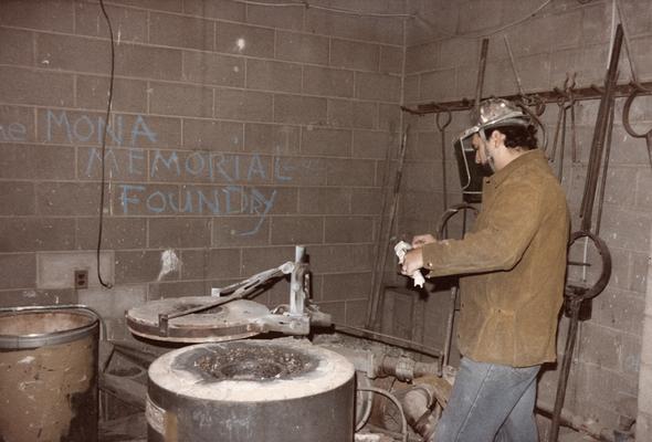 Jack Gron near the furnace in the University of Kentucky foundry. The photograph was taken by Zig Gierlach