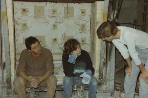 Three students in the University of Kentucky foundry. The photograph was taken by Zig Gierlach