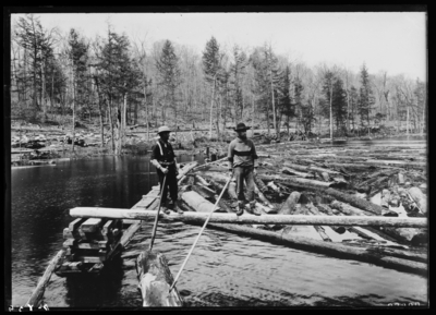 Sluicing logs thru Pinchot Dam Indian Reservation in Neopit, Wisconsin. Feb-11