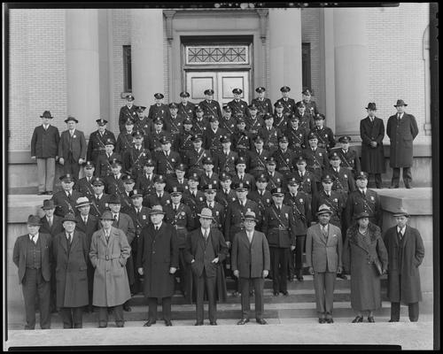 Lexington Police Department; group, detectives, unidentified men, unidentified group standing on steps of building