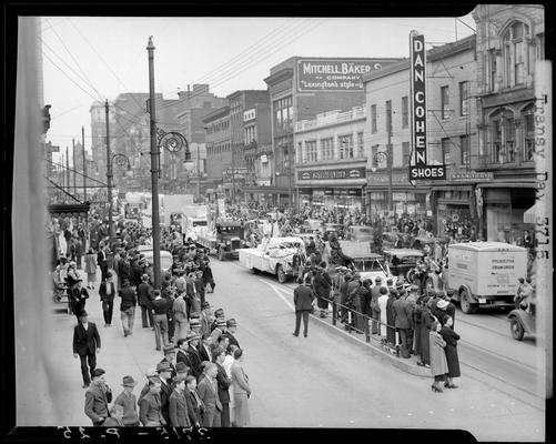 Transylvania (College) Day: parade going through downtown Lexington, exterior of Dan Cohen Shoes and B.B. Smith & Company, West Main Street