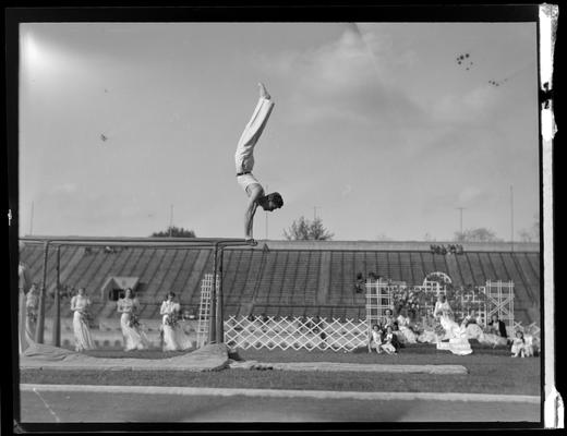 University of Kentucky May Day; car in parade with two women sitting on top