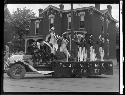 University of Kentucky May Day; float in parade, horse pulling float