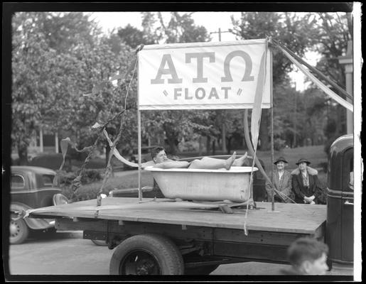 University of Kentucky May Day; float in parade, horse pulling float