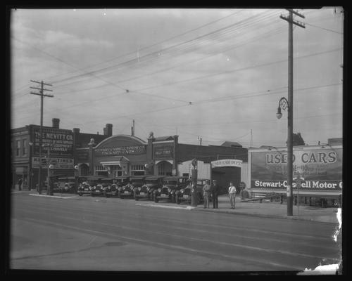 Stewart-Cassell Motor Company, 362-364 East Main; exterior ; Nevitt Company and Kelly Tires signs in background