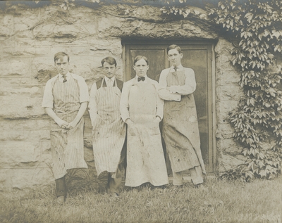 Four Chemistry students, men, handwritten on verso 