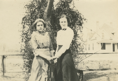 2 women standing outside