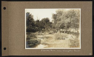 River with small trees on banks, notation                          Clarks Run - near Slaughter Place