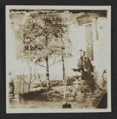 Man in garden at John S. Wilson house on Upper Street