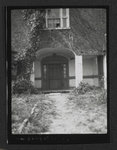 Doorway to a two story brick house. Near Springfield, Kentucky