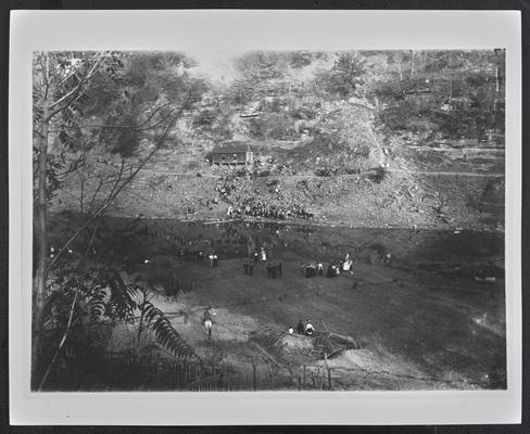 Unidentified group at the river bank