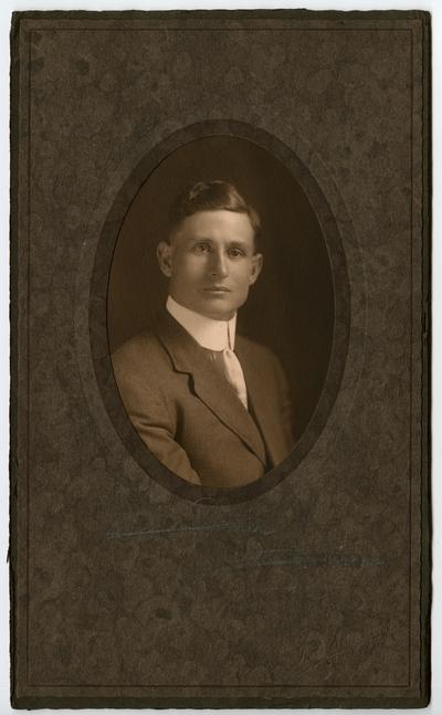 Male, unidentified, formal portrait in a suit