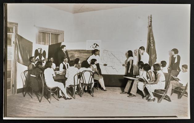 Arizona students. Unidentified group of Hispanic students, sitting in a classroom and looking at a map of the United States