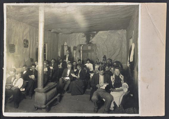 Kentucky students. Back of the photograph reads: 38 enrolled in day school, 46 in night school, oldest pupil 82 years. 1 preacher 75 years of age enrolled. 5 taught to read and write, Claude Turner teacher