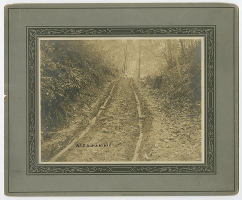 Mountain road, back of the photograph reads: For road building lesson