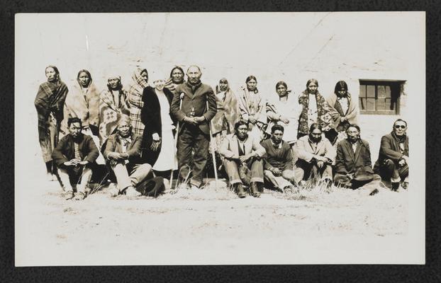 Group of unidentified men, women, and children